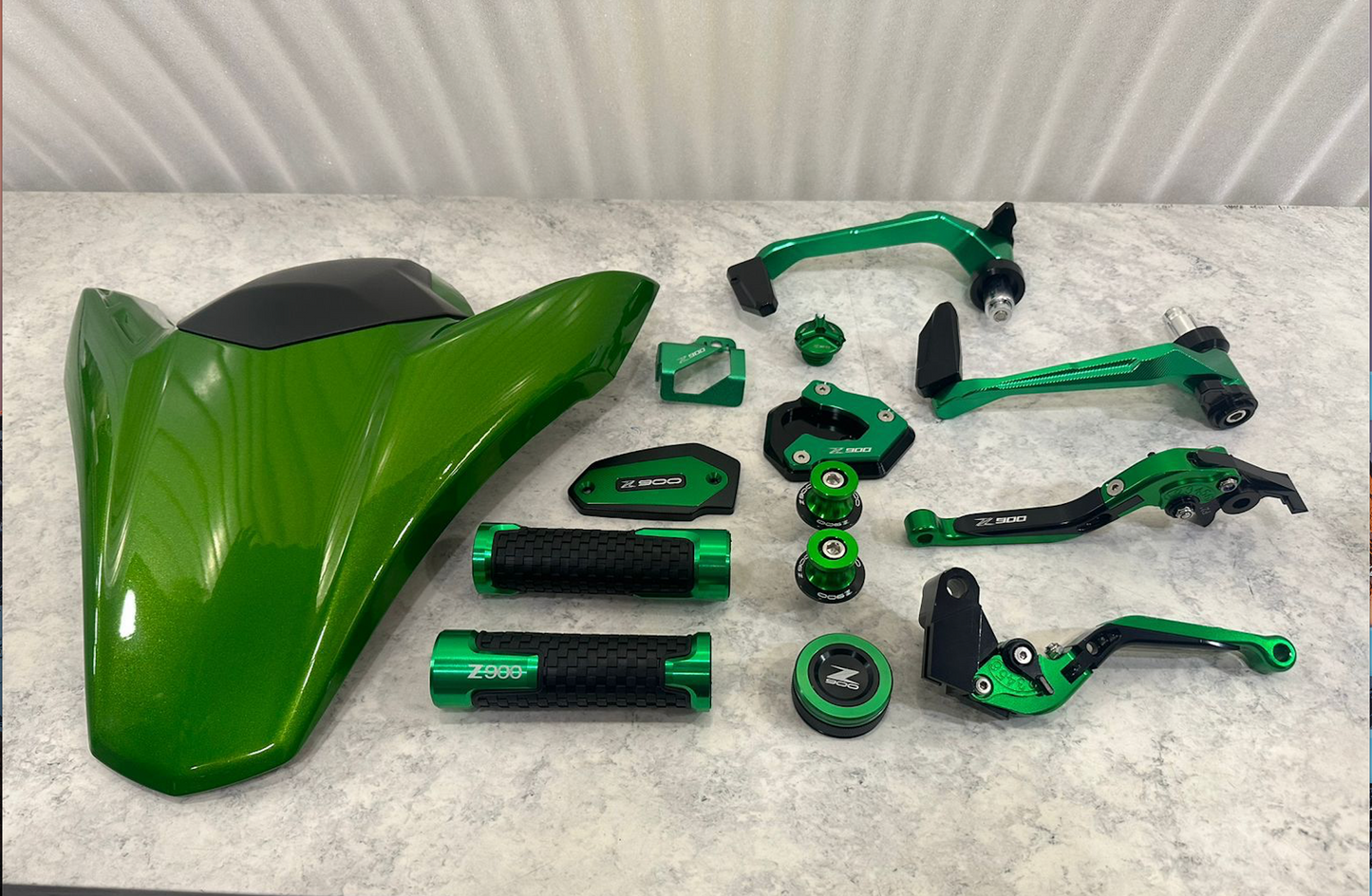 Combo of Kawasaki Z900 Accessories Rear Seat Cowl ,engine oil cap bolt , Lever Clutch, Handle Grip,hand guard / lever guard Front and Rear Brake Fluid Cover, Disc Oil Cap, Bike Side Stand Extender with Z900 Logo Complete 10 Items (Green)