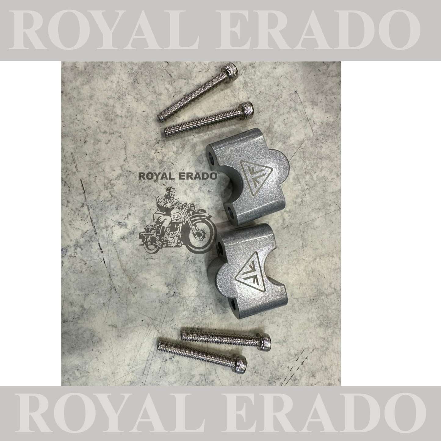 Triumph handle bar riser in silver